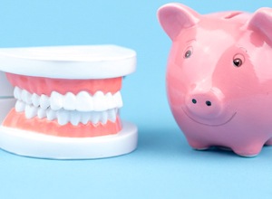 piggy bank and dentures