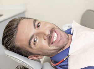smiling male dental patient