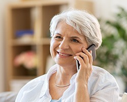 Older woman speaking on phone