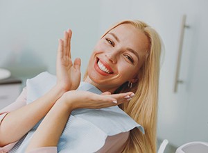 Happy dental patient showing off her smile